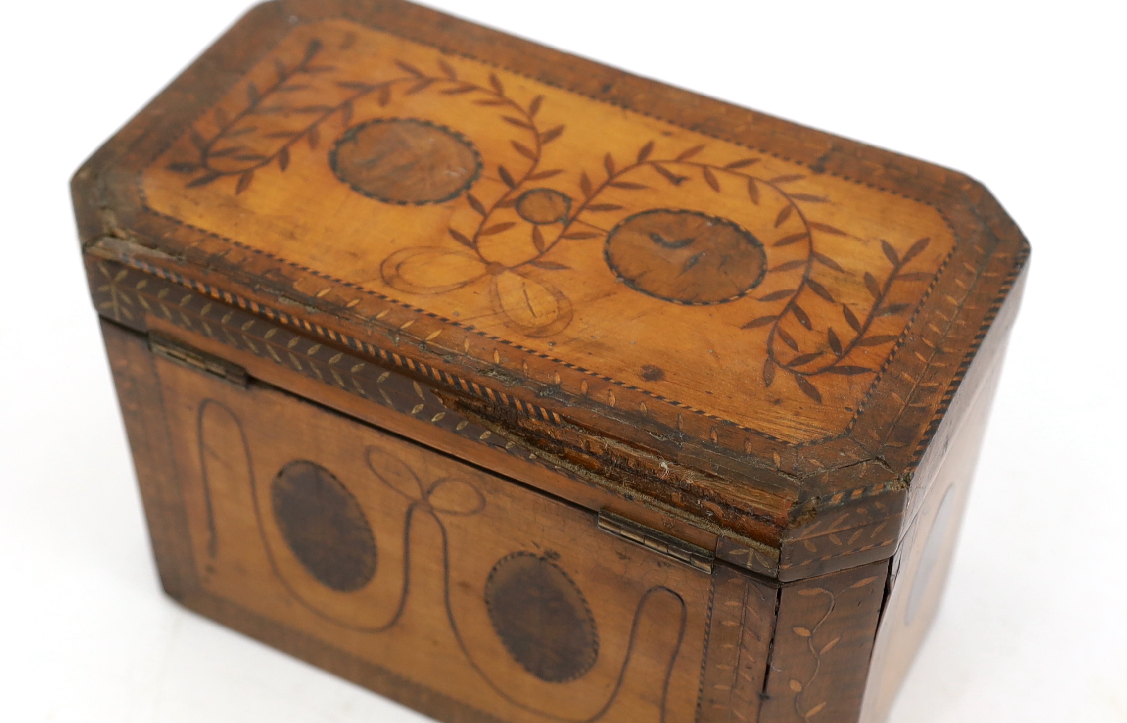 A George III Sheraton style marquetry inlaid satinwood tea caddy 20.5cm wide, 11.5cm deep, 13cm high